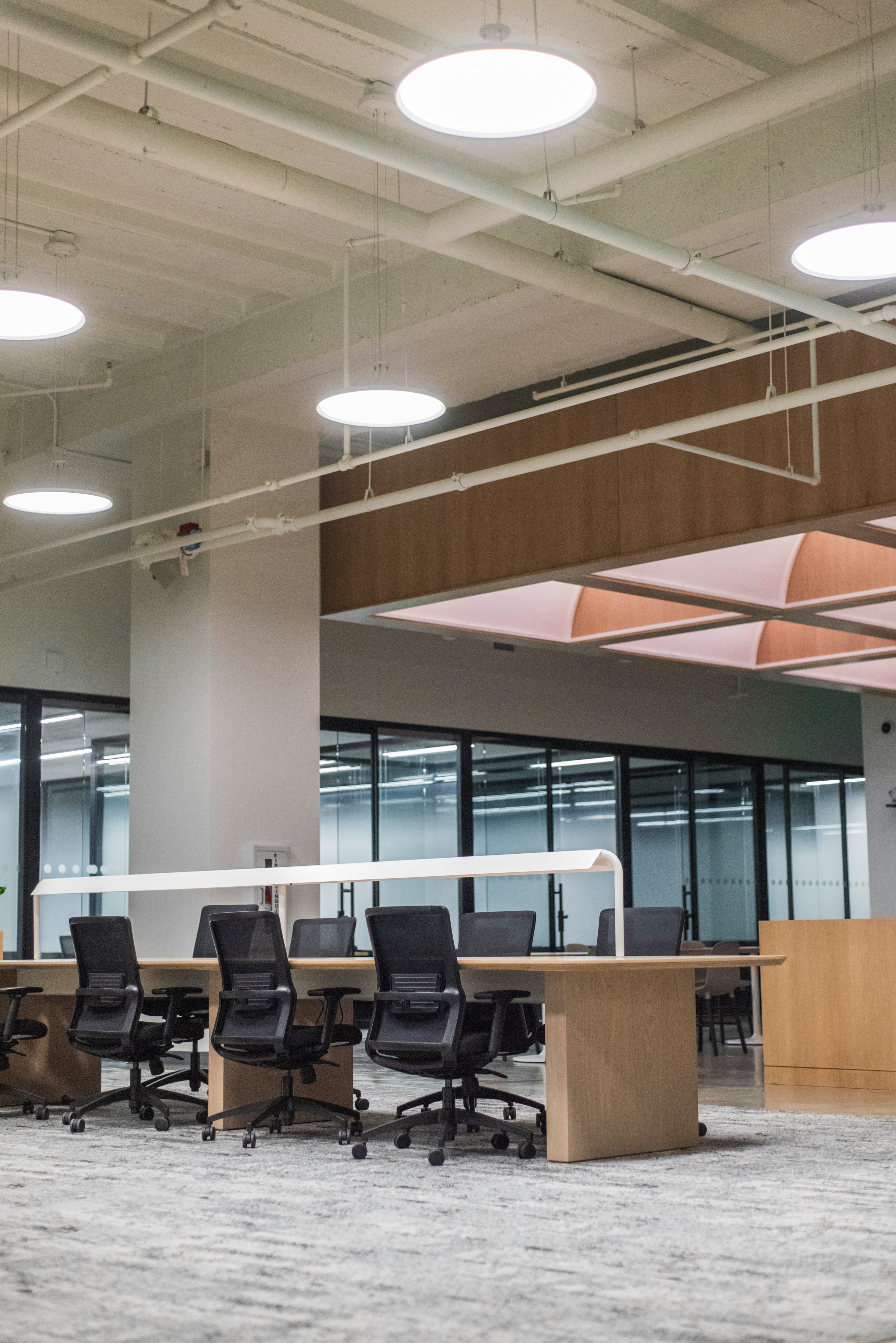 A modern commercial office interior with city views